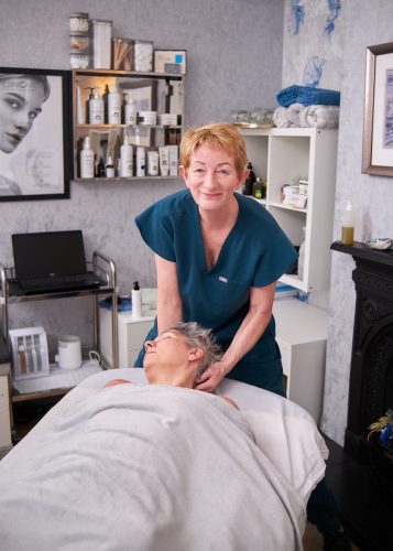Ann at Chinley massage working on a client 